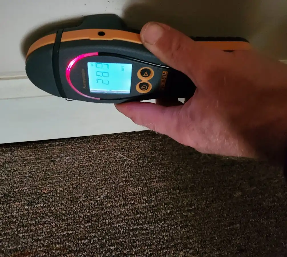 Moisture detection at baseboard during Storm Damage Restoration in Vandenberg Village